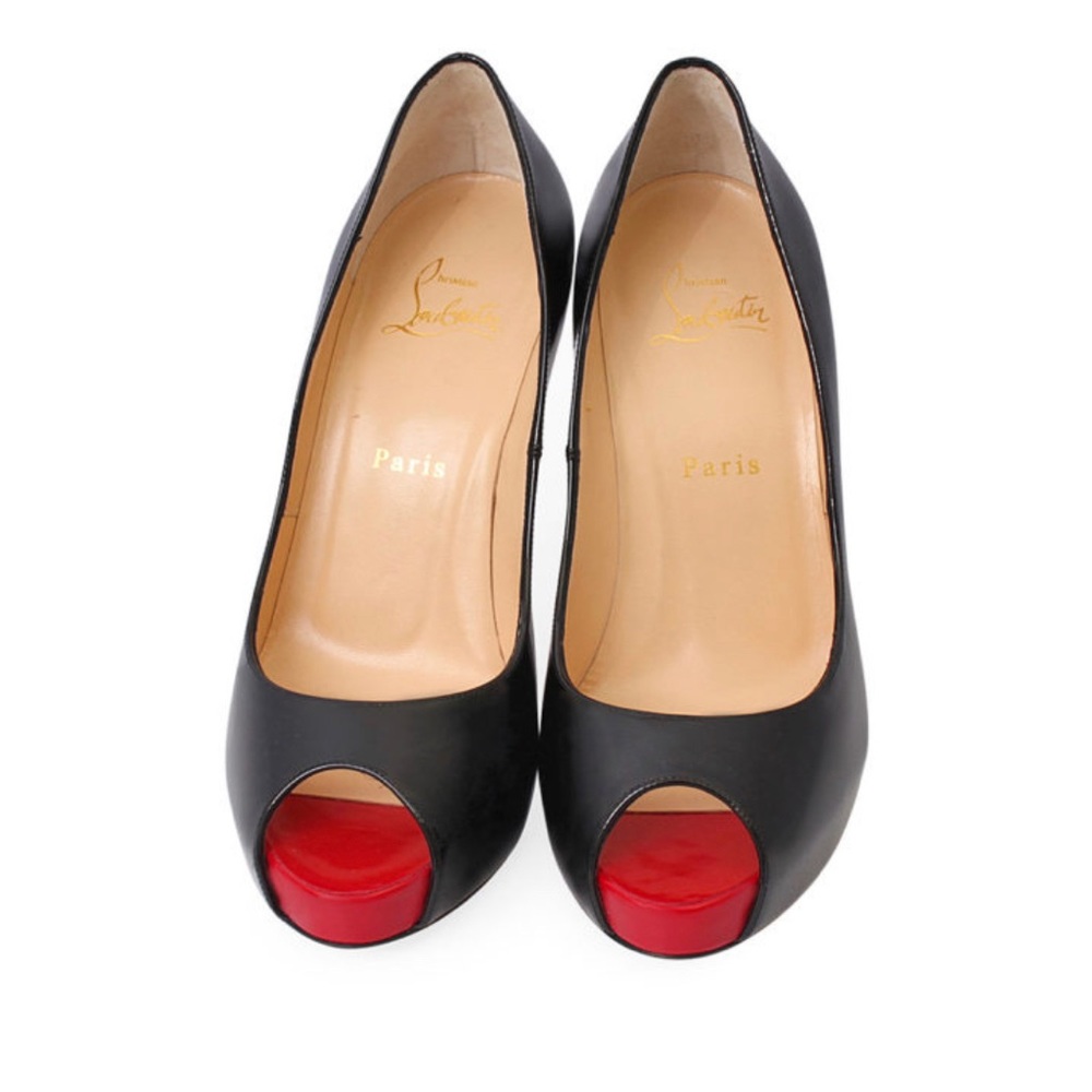 - Christian Louboutin red toes